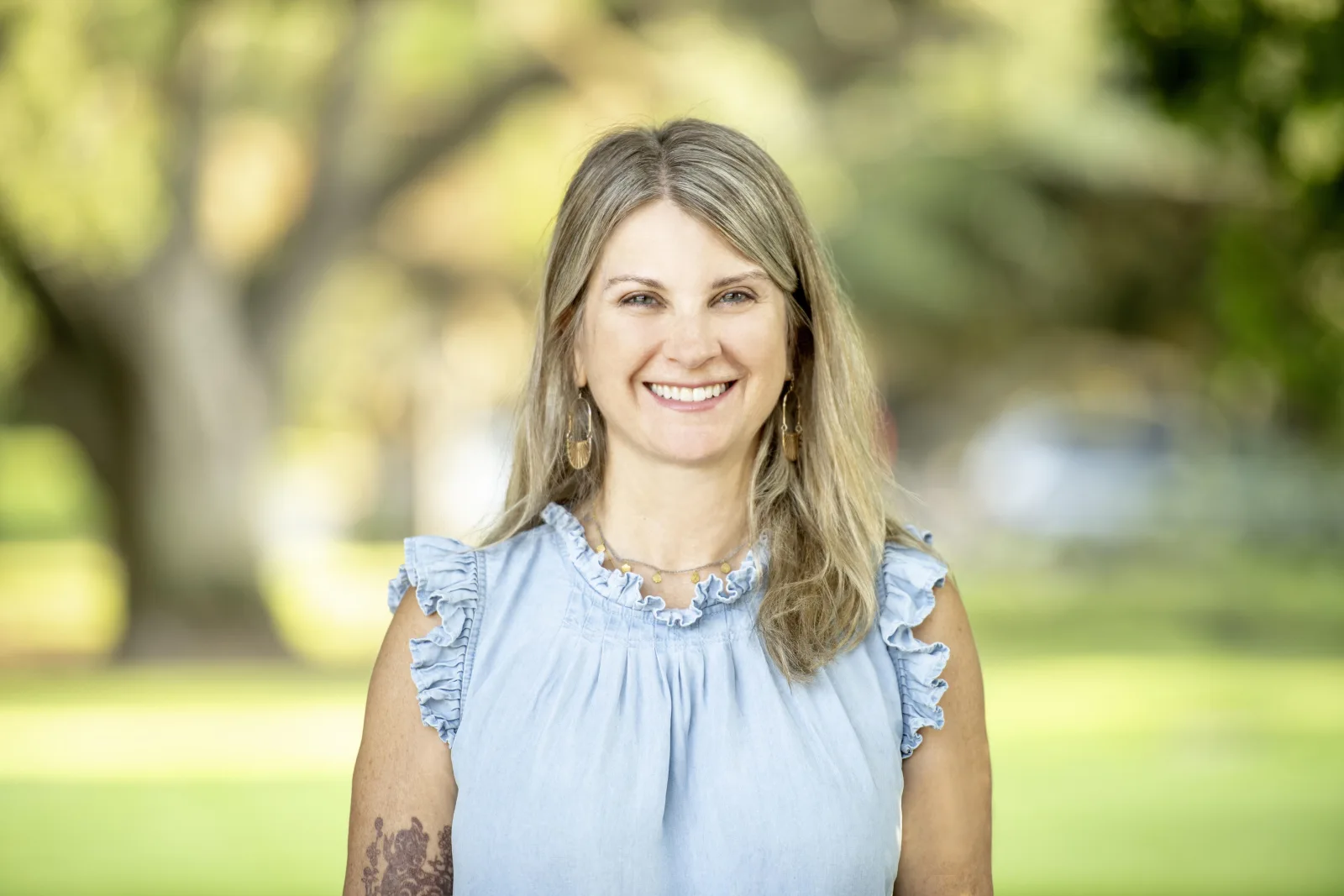 Laura Lund, Master Holistic Esthetician, photographed outdoors